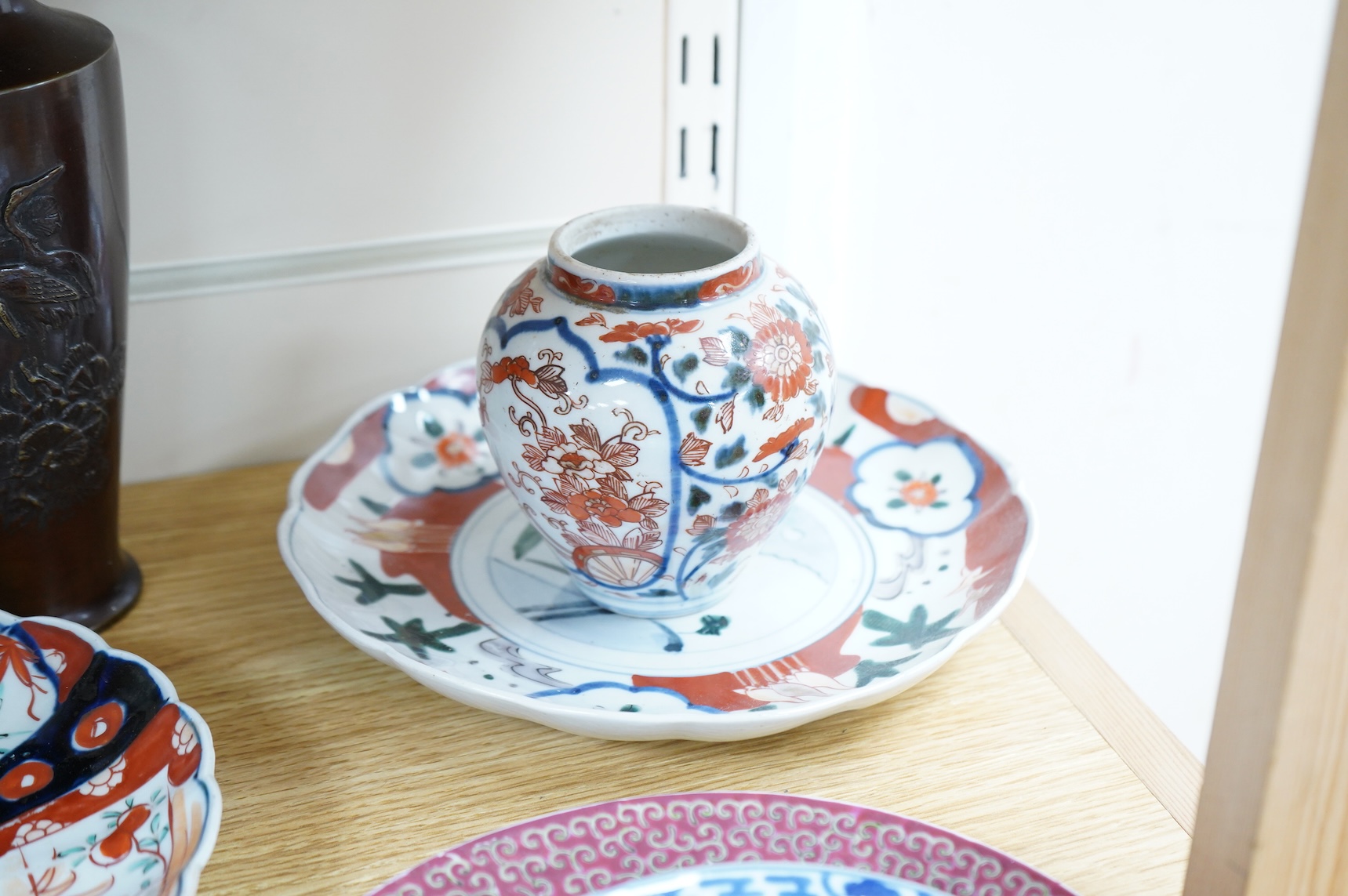 A collection of Asian ceramics to include an inside painted glass snuff bottle, pink ground dish and an Imari dish